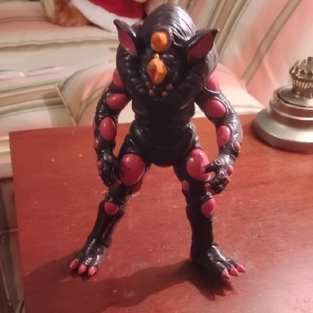 Black and Red Monster Action Figure